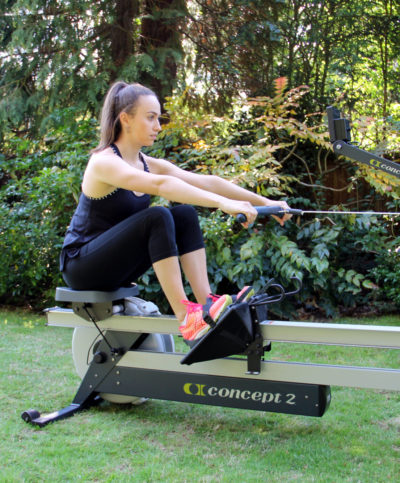 Lady using a rowing machine